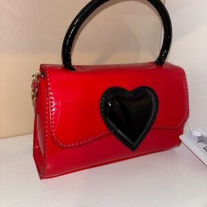 Red and Black Cosmetic Bag with Heart Accent